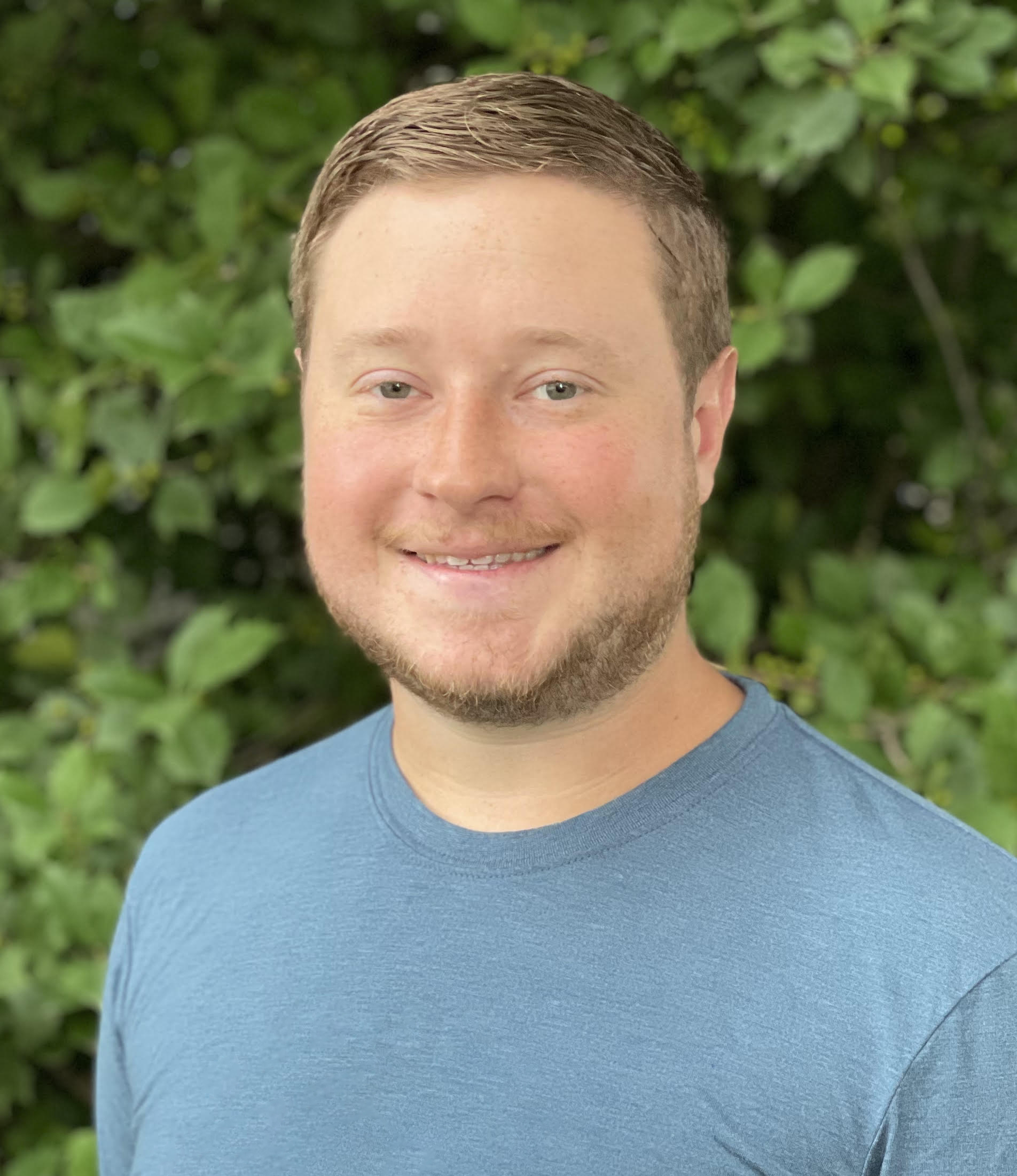 Headshot photo of Nick Faulkner