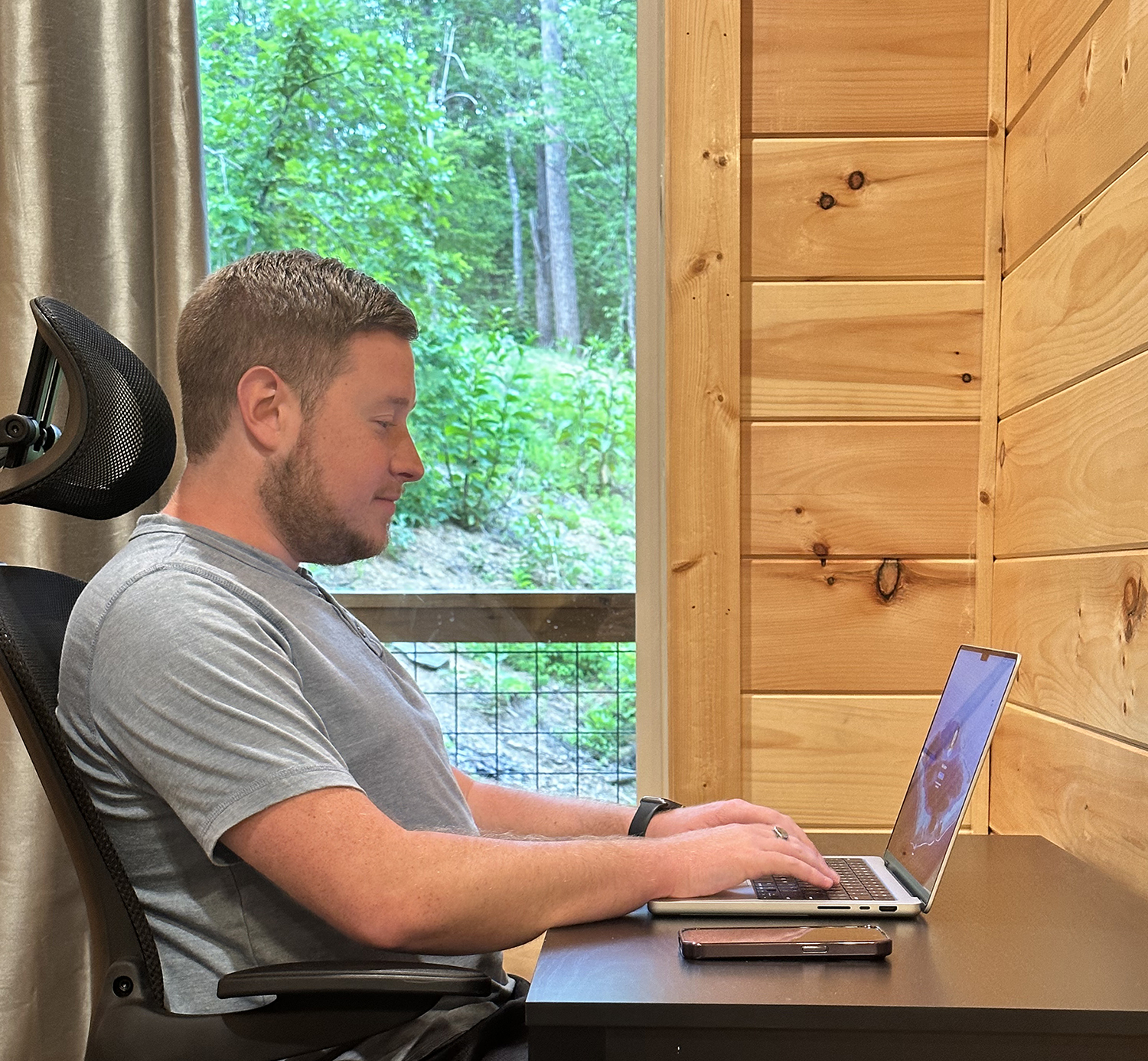 Nick working on computer at a desk